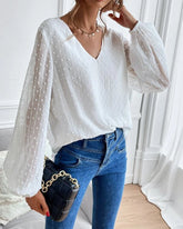 Enfärgad blus med V-ringad